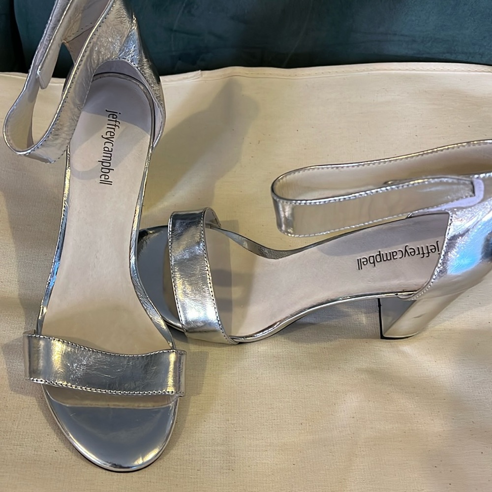 These never been worn Jeffrey Campbell are ready jeans or a cute dress.